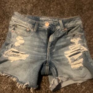 American Eagle Outfitters Ripped Light Blue Jean Shorts